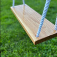 Load image into Gallery viewer, side view of hickory wood bench swing for children and adults shown with durable white rope