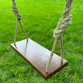Load image into Gallery viewer, side angle view of child size walnut bench swing with natural rope