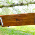 Load image into Gallery viewer, bottom view of hickory bench swing installed on tree branch outside