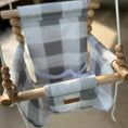 Load image into Gallery viewer, Front view of weather-resistant baby swing in gray buffalo check fabric