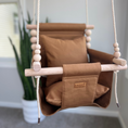 Load image into Gallery viewer, Brown baby swing with wooden beads against a neutral background