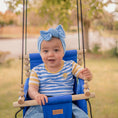 Load image into Gallery viewer, Toddler Girl in outdoor swing playing with beads