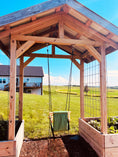 Load image into Gallery viewer, back view of premium outdoor toddler swing installed on wood pergola, durable and safe