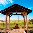 Load image into Gallery viewer, outdoor baby swing installed in outdoor pergola