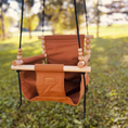 Load image into Gallery viewer, Premium outdoor baby swing shown with twisted black rope, safe and secure waist belt included