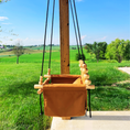 Load image into Gallery viewer, side view of premium outdoor baby swing in nutmeg color, fade resistant fabric
