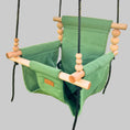 Load image into Gallery viewer, Outdoor baby swing shown in sage green with twisted black ropes
