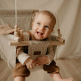Load image into Gallery viewer, Baby using neutral confetti high back swing, safe indoor design