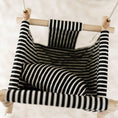 Load image into Gallery viewer, Top view of classic black and white stripe pattern high back baby swing, shown with one pillow, safe indoor design