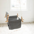 Load image into Gallery viewer, Side angle of classic black and white stripe pattern indoor high back baby swing, classic neutral