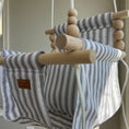Load image into Gallery viewer, Side view of Wide Black Ticking Stripe baby swing with natural wooden dowels and beads
