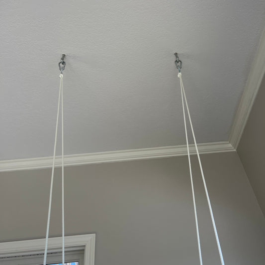 Ceiling mount view of wide black ticking stripe  secure indoor baby swing