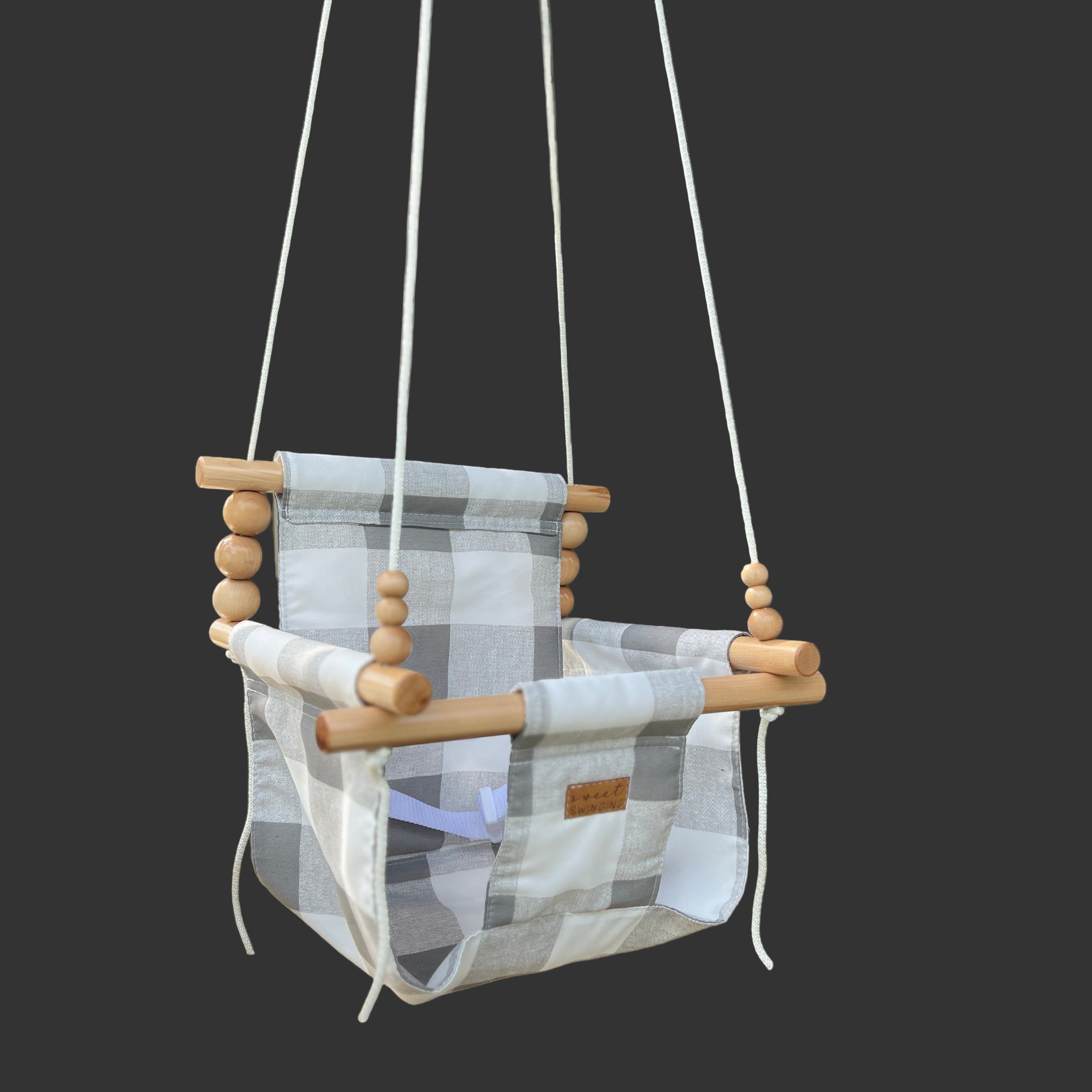 Gray buffalo check baby swing with high back support, outdoor use