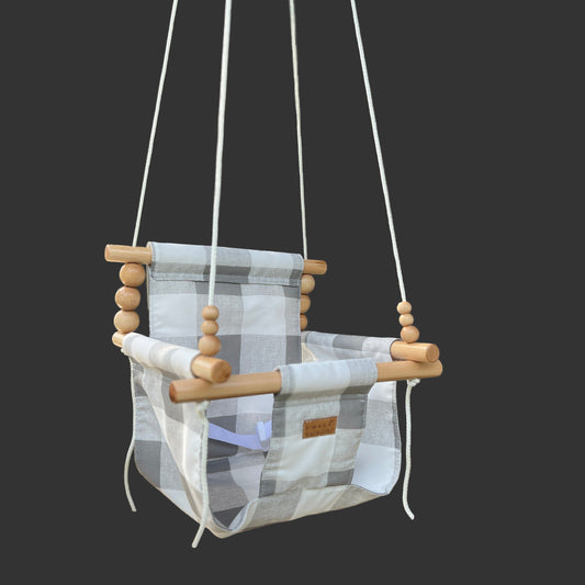 Gray buffalo check baby swing with high back support, outdoor use